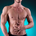 muscular-man-holding-his-stomach