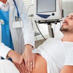 abdominal-pain-s12-photo-of-doctor-performing-physical-exam-on-patient