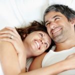 happy-couple-in-bed-1024×987