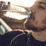 man-drinking-water
